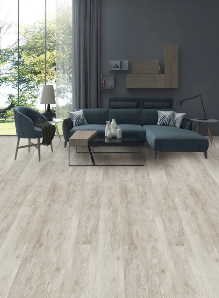 Maxxi Floors Summit Oatmeal Luxury Vinyl Flooring planks installed in a bright living room.