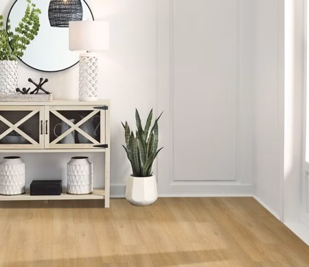 Armstrong DLuxe Plank HDPC Foundation Golden Valley flooring installed in a room