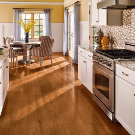 Hartco Prime Harvest Gunstock hardwood flooring installed in a room