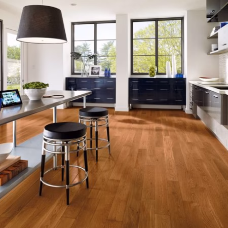 Hartco Prime Harvest Elite Gunstock hardwood flooring installed in a room