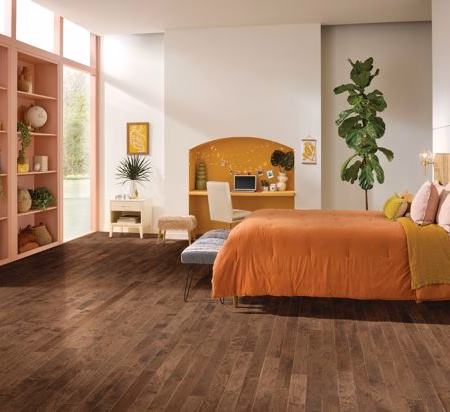 Hartco Prime Harvest Basic Brown hardwood flooring installed in a room