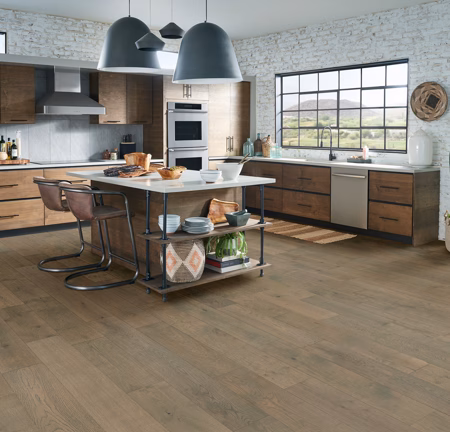 Bruce Brushed Impressions Platinum Renewed Taupe hardwood flooring installed in a room