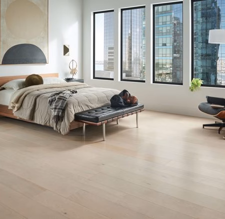 Armstrong Flooring Wanderer's Way Heavenly Taupe hardwood flooring installed in a room