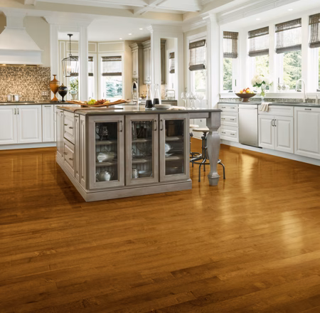 Hartco Prime Harvest Spice Brown hardwood flooring installed in a room