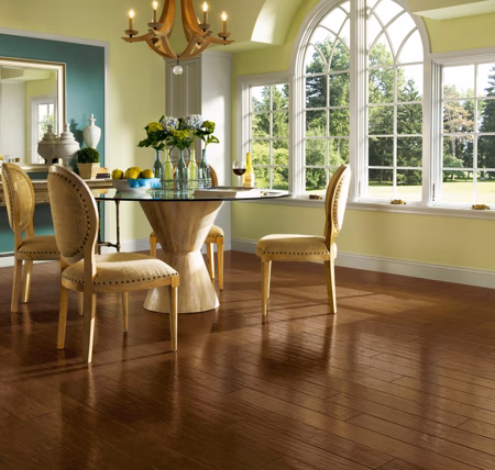 Hartco American Scrape Candy Apple hardwood flooring installed in a room