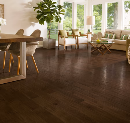 Hartco American Scrape Brown Ale hardwood flooring installed in a room