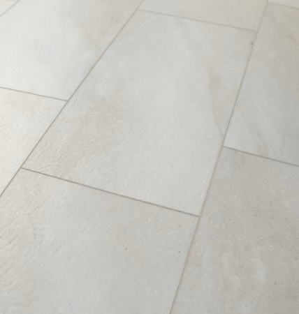 Anything Goes! CoreTec LVT Timeless Appeal Summit Stone showing light stone-look rectangular vinyl tiles