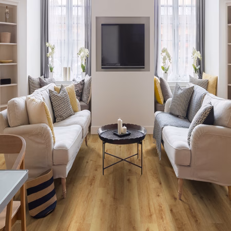 Axiscor Prime Plus Oak Natural vinyl flooring installed in a room