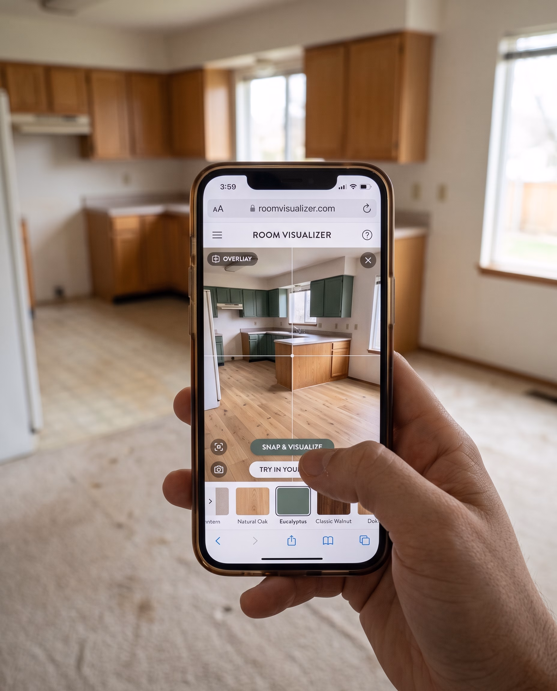 A homeowner using a mobile visualizer app on their smartphone to preview and transform an outdated kitchen and living space with new hardwood flooring and premium green cabinetry.